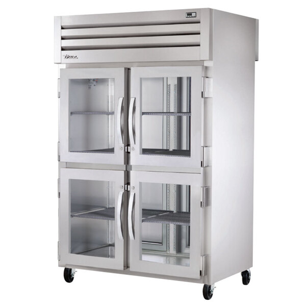 A True Spec Series pass-through refrigerator with glass doors.