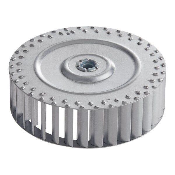 A circular metal Vulcan blower wheel with holes in it.