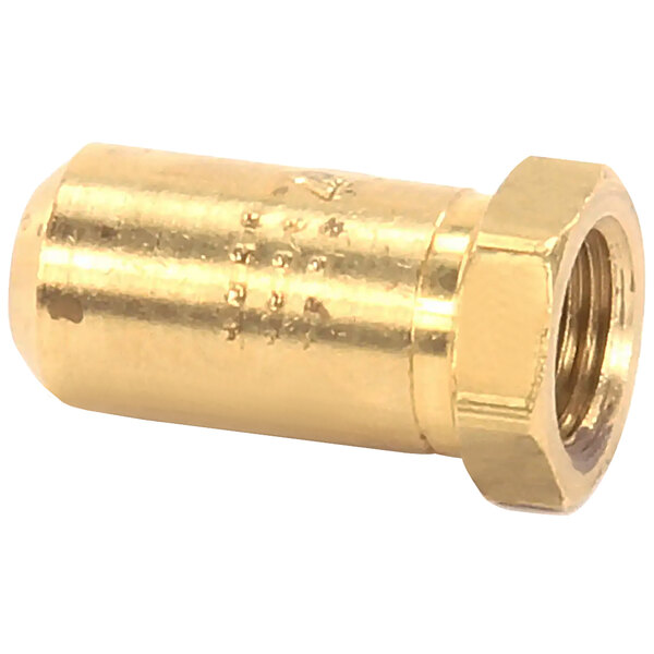 A close up of a brass orifice nut with a round top.