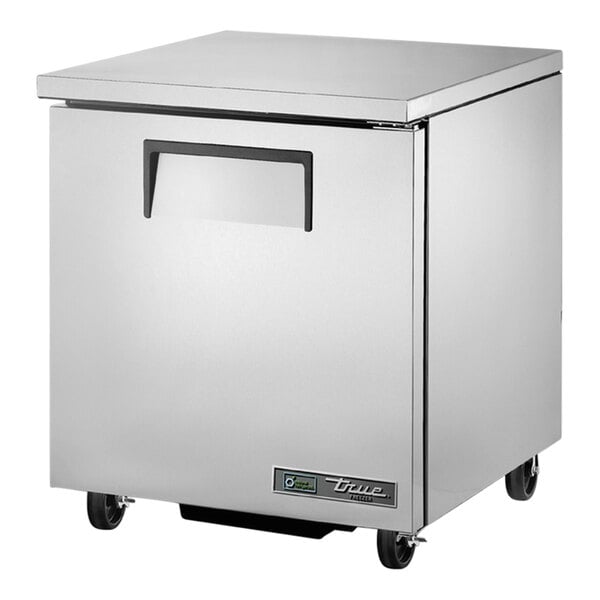 A silver True undercounter freezer on wheels.