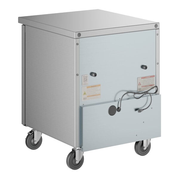 A True undercounter freezer on wheels with a metal cabinet.