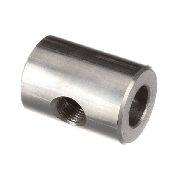 A close-up of a stainless steel metal cylinder with a threaded hole.