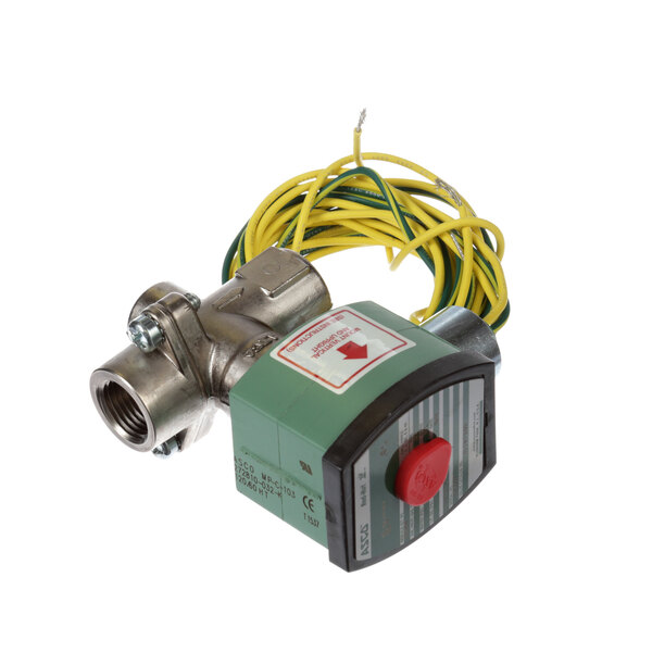 A close-up of a green and yellow Henny Penny solenoid valve with wires.