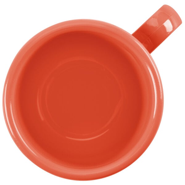 An orange GET Diamond Mardi Gras mug with a handle.