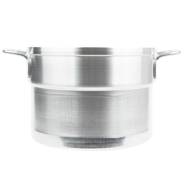 A silver aluminum inset for a double boiler.