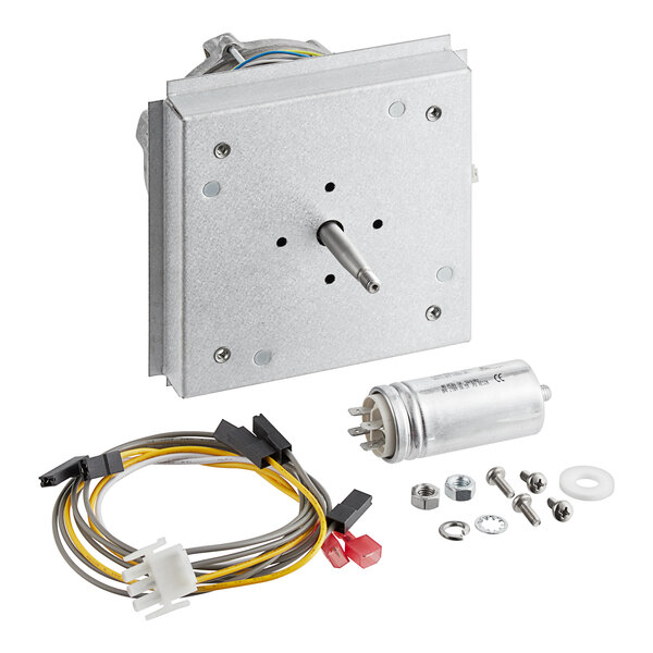 A metal square with a small metal box and wires inside, with a metal rod.