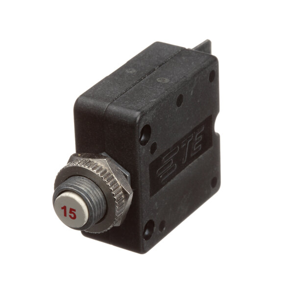 A black electrical switch with a silver button on a black box.