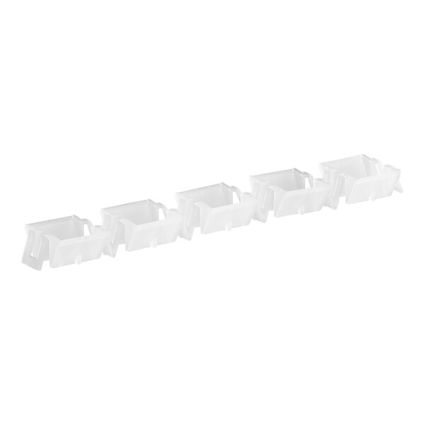 A row of white plastic Hoshizaki spray guides.