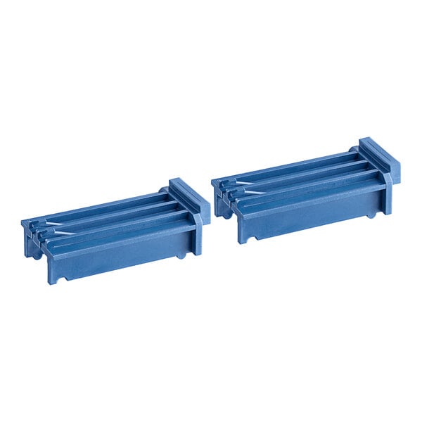 Two blue plastic Edlund Slidebar Universal Base Inserts.