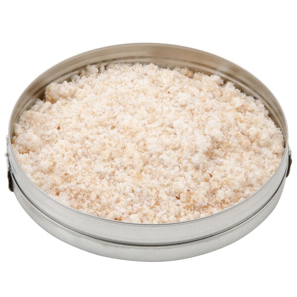 A round metal tin of white Rokz cranberry cocktail rimming sugar.