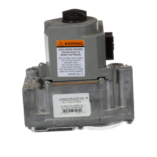 A grey metal Groen LP valve with a white label.