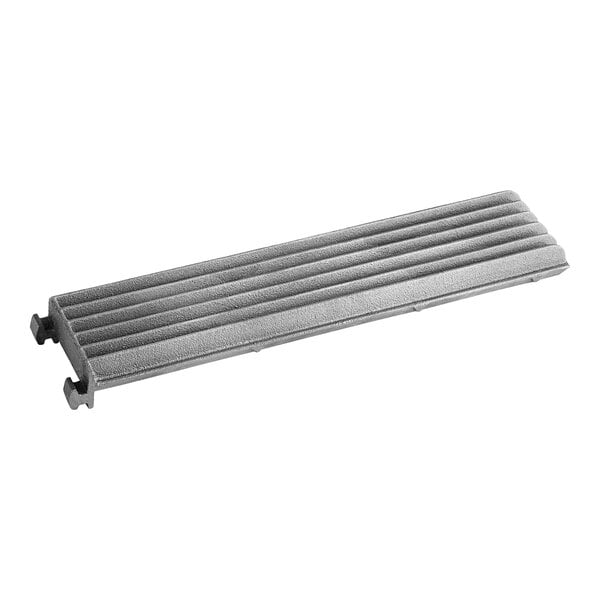 A grey metal Vulcan 6 rib grate.