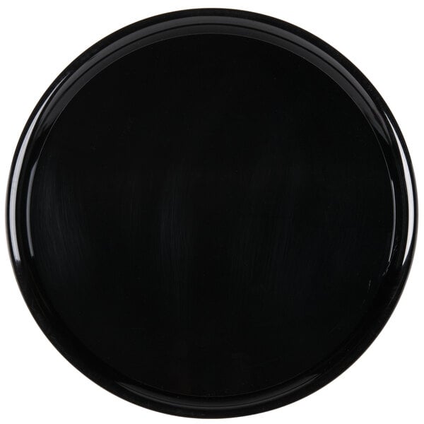 A black round catering tray.