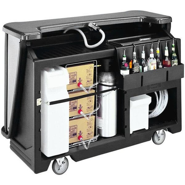 A black Cambro portable bar with bottles on it.