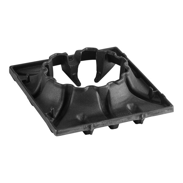 A black plastic Garland grate with a hole in the middle.