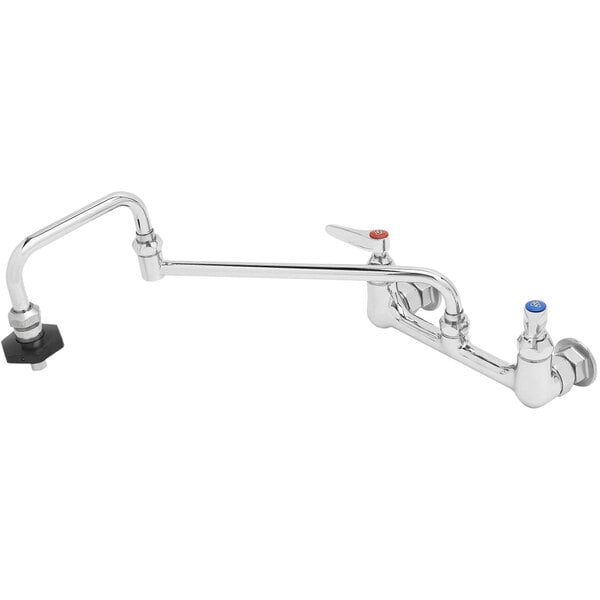 A stainless steel T&S wall mounted pot filler faucet with two handles and a red button.