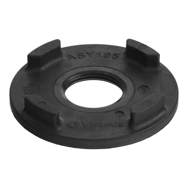 A black Vitamix 15585 Advance retainer nut with raised sections and a central threaded hole.
