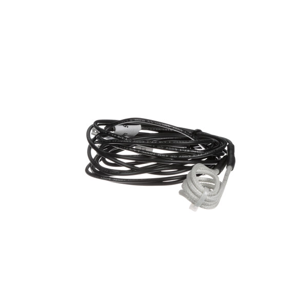 A Hussmann drain line heater with a black and white cord and plug.