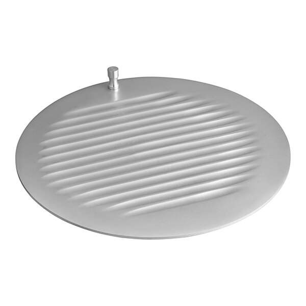 A white metal Berkel center plate with a circular design.