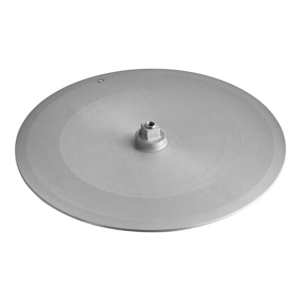 A silver metal Berkel center plate with a hole and nut.