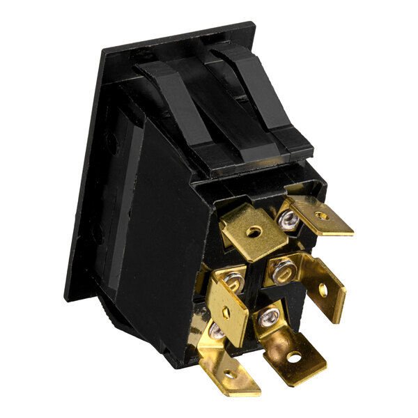A black electrical switch with gold metal parts.