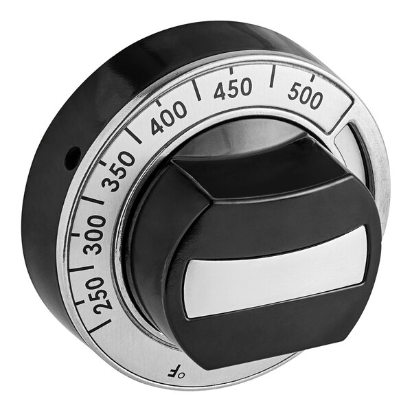 A round black and silver knob with white numbers on it.