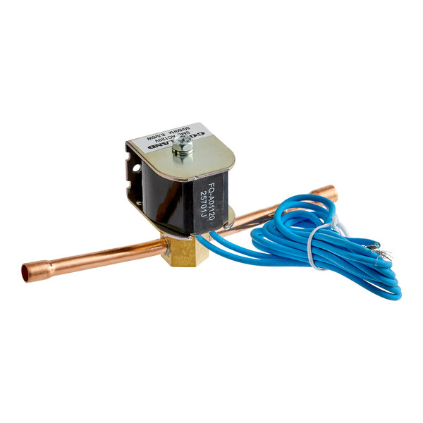 A solenoid valve with copper tubing, a metal housing, and attached blue electrical wires.