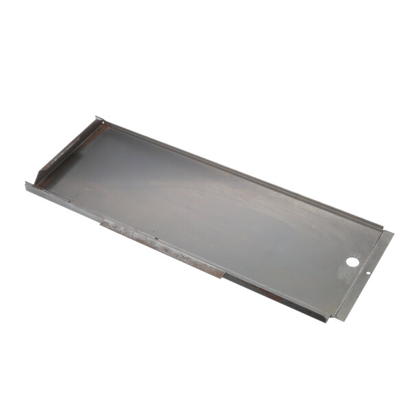 A metal plate with a hole in it.