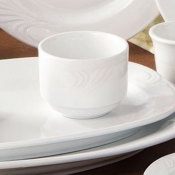 A close up of a CAC porcelain white bouillon bowl.