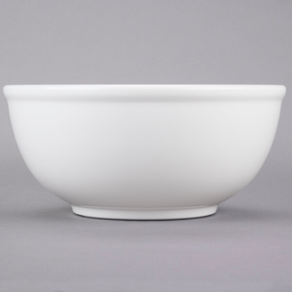 A white Cal-Mil melamine bowl.