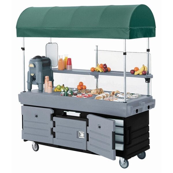 A Cambro vending cart with a green canopy.