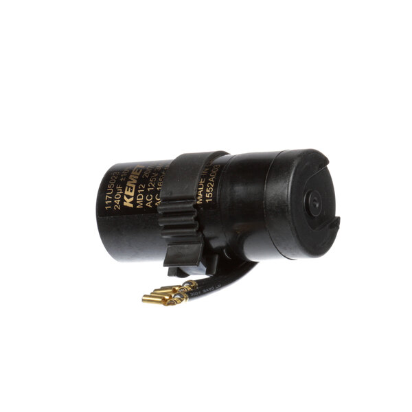 A black round Franke start capacitor with a black strap.
