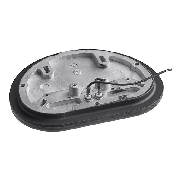 A close-up of a black and silver Vollrath Heater Cast.