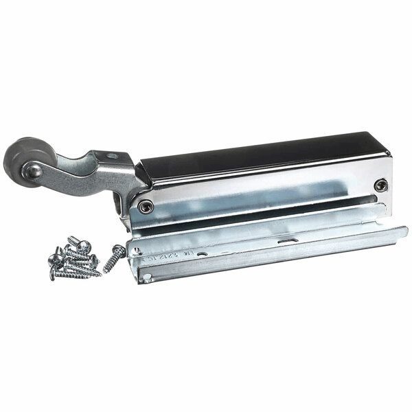 A Kolpak metal door closer with screws on a metal surface.