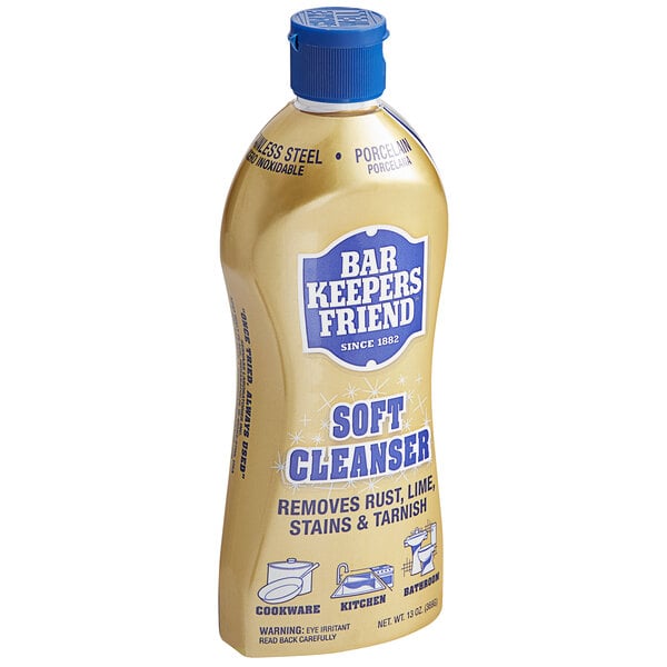 A plastic bottle of Bar Keepers Friend soft cleanser on a counter.