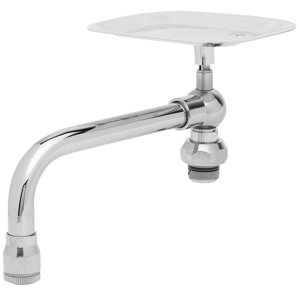 A silver faucet nozzle with a soap dish attachment.