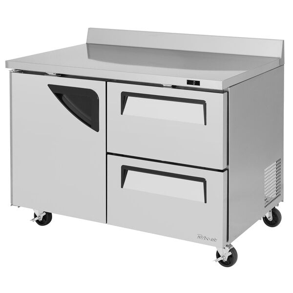 A stainless steel Turbo Air worktop freezer with one door and two drawers.