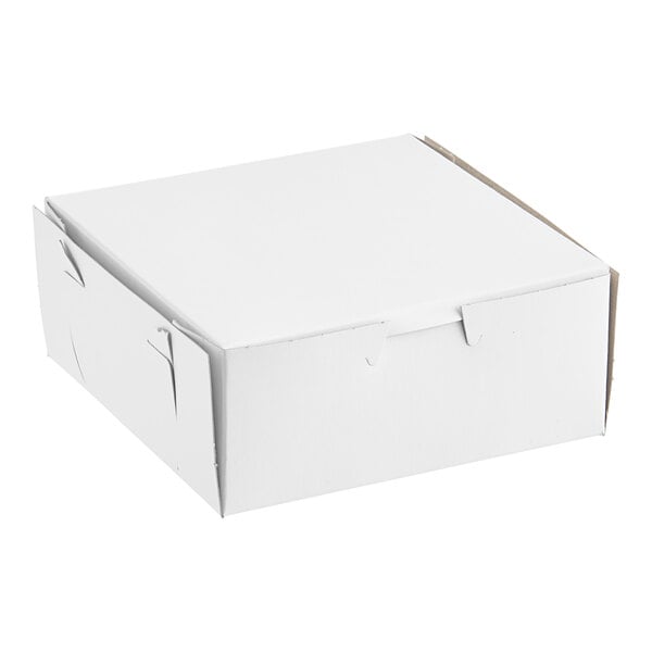 A plain white, square bakery box with a closed lid, measuring 6 by 6 by 2.5 inches.