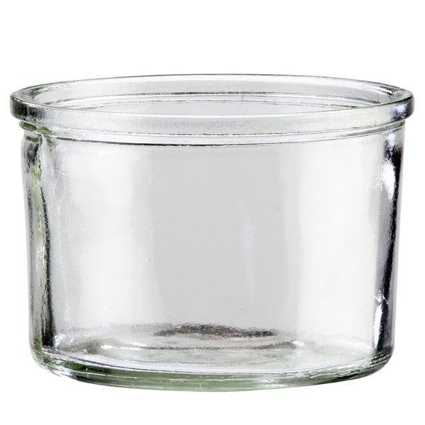 A clear glass container with a lid.