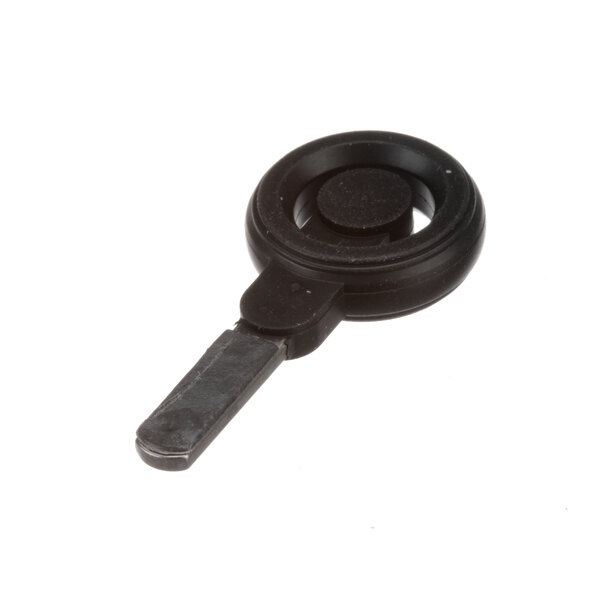 A black plastic circular bearing pad with a metal handle.