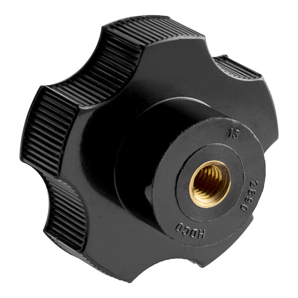 A black, star-shaped knob with a textured grip and a central brass threaded insert.