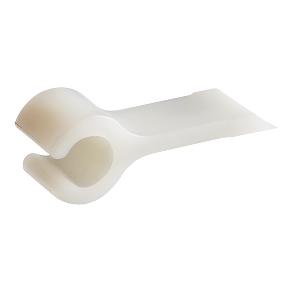 A white plastic Cleveland scraper blade with a hole in the handle.