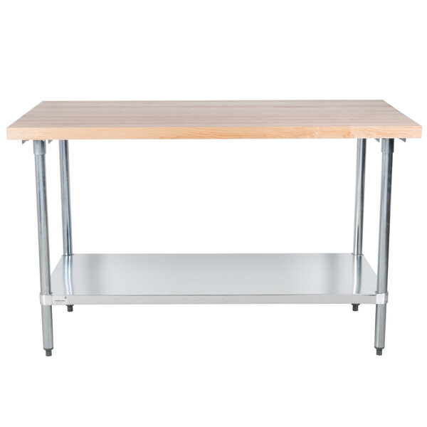 An Advance Tabco wood top work table with a galvanized metal undershelf.