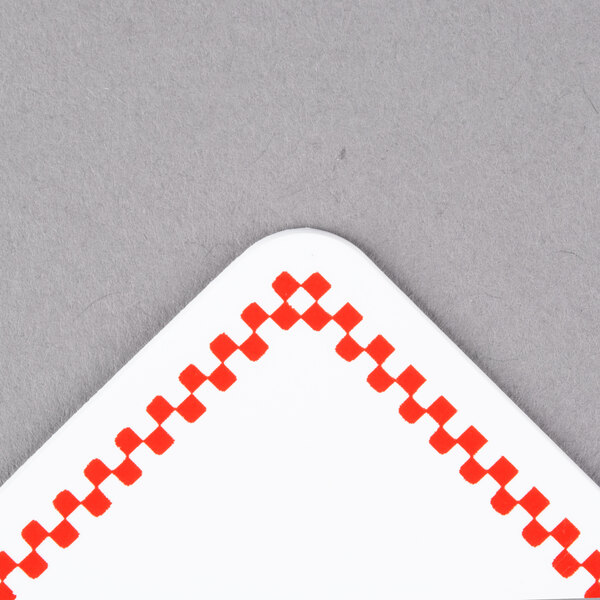 A white square Ketchum Manufacturing deli tag with a red checkered border.