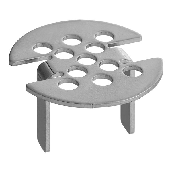 A stainless steel Vollrath hot well drain screen with holes.