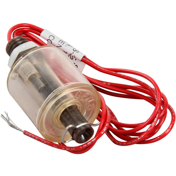 A close-up of a Grindmaster Cecilware switch float with a small red wire.