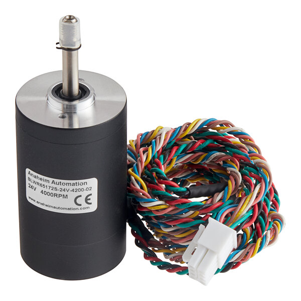 A close-up of a black Metro RPC13-503 DC motor with a coil of multicolored wires.