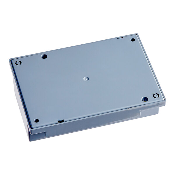 A grey rectangular Cleveland Ignition Module with holes and screws.