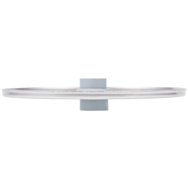 A close up of a metal Robot Coupe 1/16" Grating/Shredding Disc.