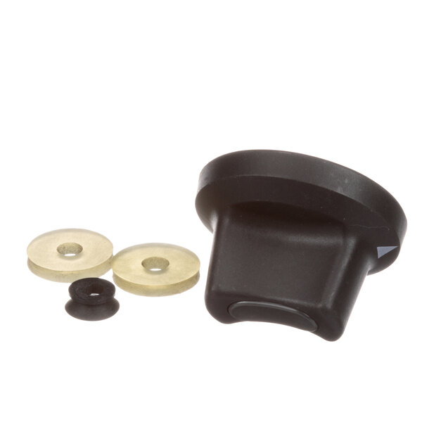 A black plastic Cleveland Combi knob with two nuts on a counter.